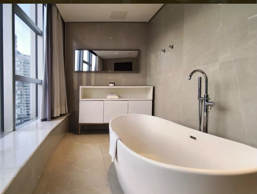 Luxury with Bathtub — soaking tub by the window